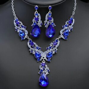 Elegant Blue and Silver Necklace with Teardrop Pendant and Matching Earrings